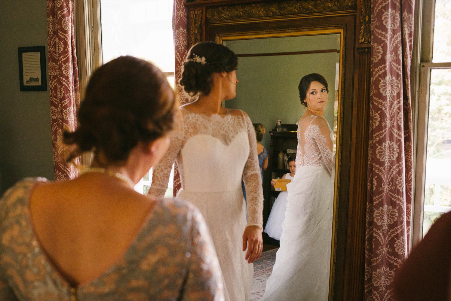 Bride checks mirror Barr Mansion Austin Wedding Photos-Philip Thomas