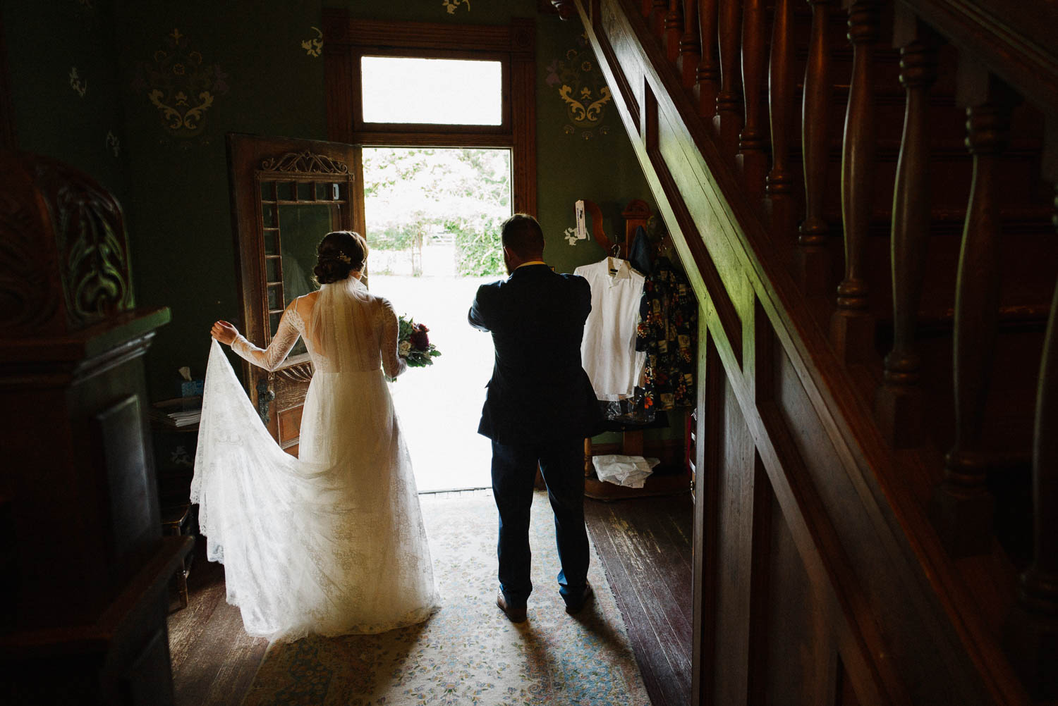 Brides brother wait their turn to commence wedding ceremony inside Barr Mansion Austin Wedding Photos-Philip Thomas