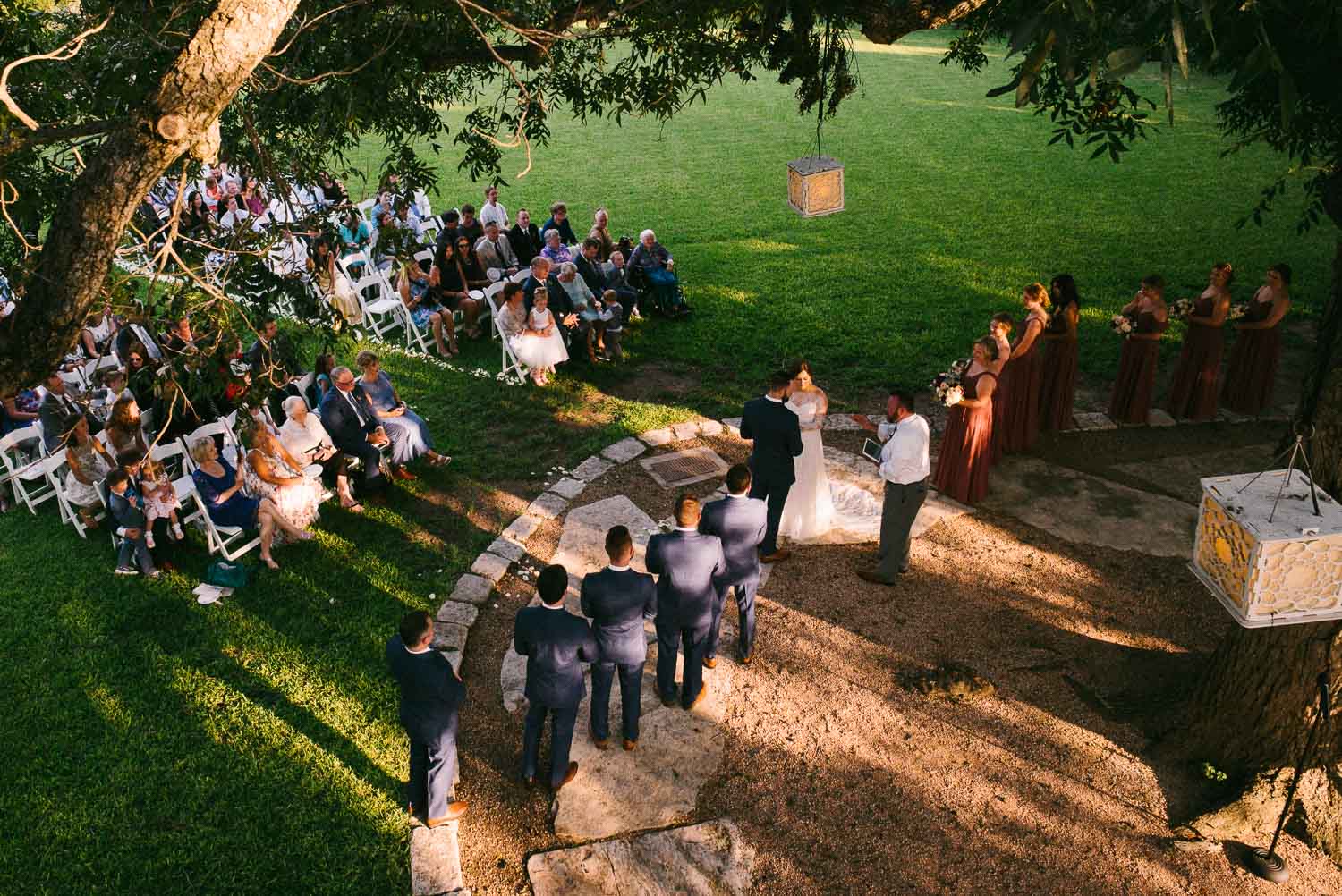 A view from the porch looking down during a wedding ceremony Barr Mansion Austin Wedding Photos-Philip Thomas