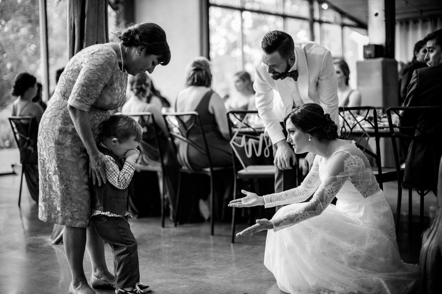 Wedded couple encourage shy boy Barr Mansion Austin Wedding Photos-Philip Thomas