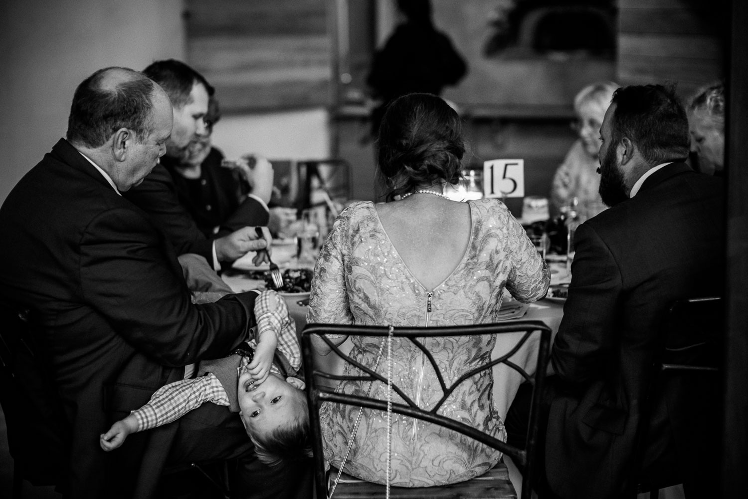 Ring bearer relaxes with wedding guests Barr Mansion Austin Wedding Photos-Philip Thomas