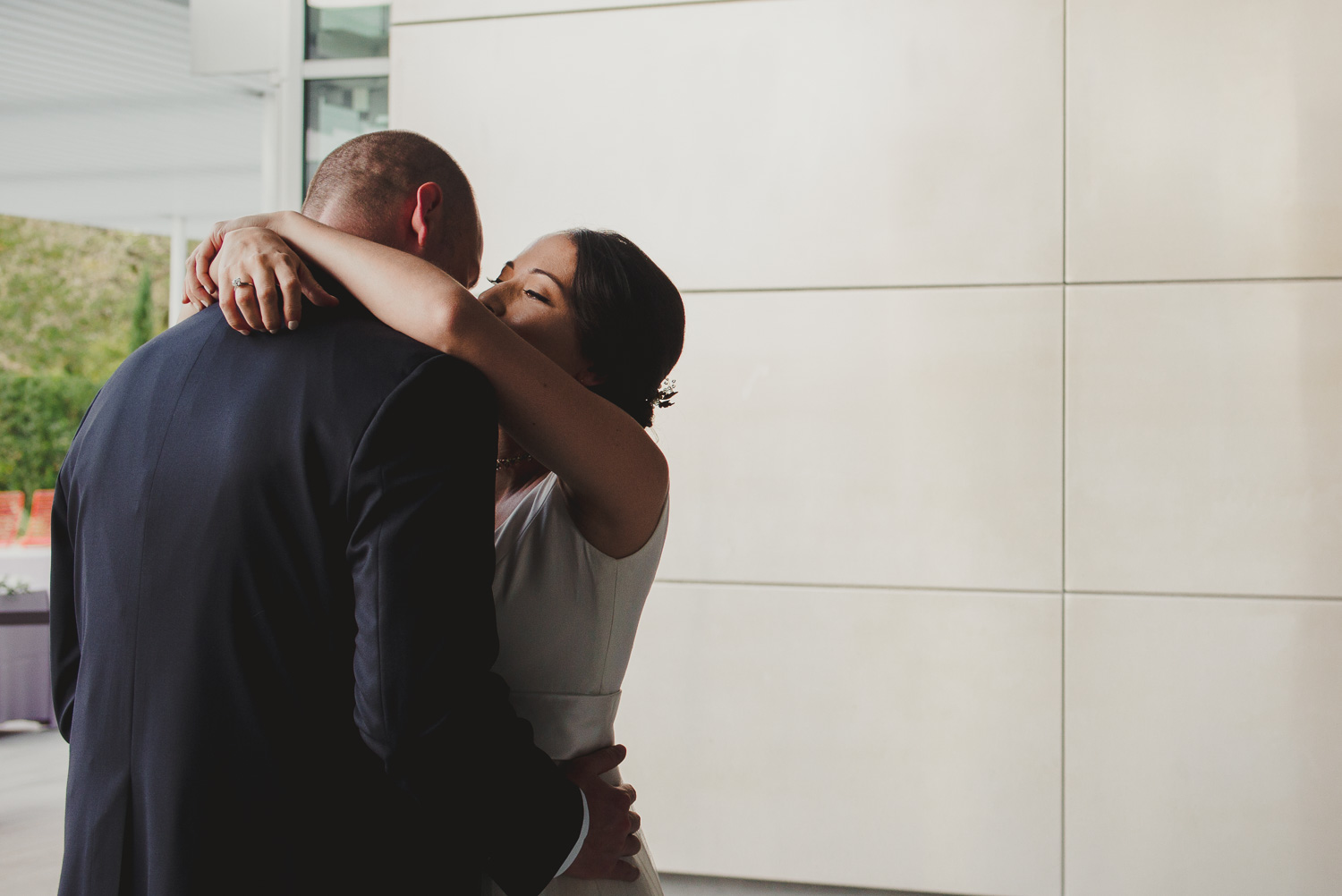 Couple embrace after their first look -Cherie Flores Garden Pavilion Wedding Hermann Park Houston Texas-Philip Thomas