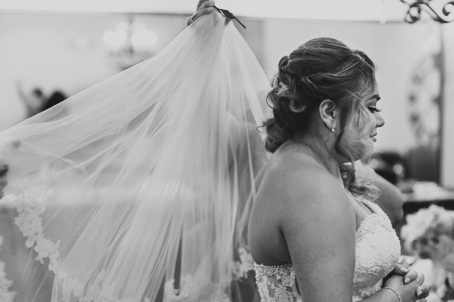 Bride has help with her veil added moments before first look The Springs Event Venue Wedding Photos-Philip Thomas