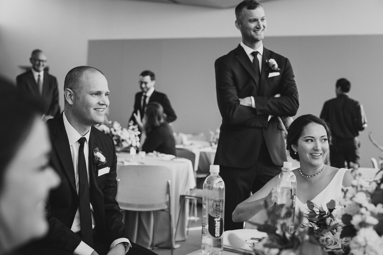 bride and groom relaxing together with friends before ceremony at Cherie Flores Garden Pavilion Wedding Hermann Park Houston Texas-Philip Thomas