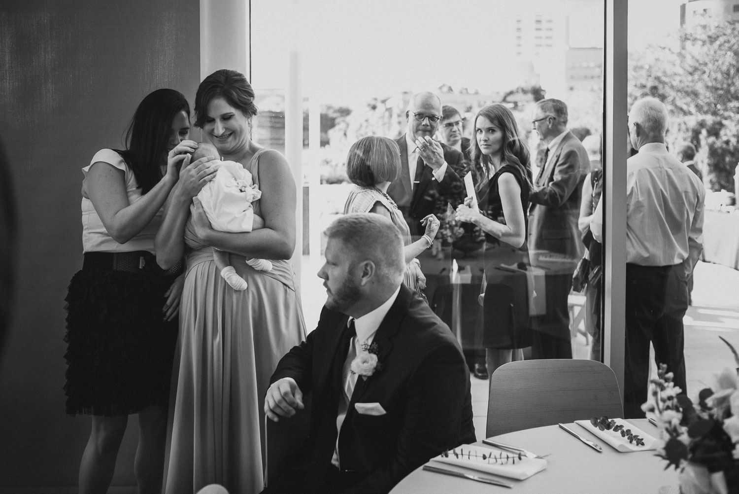 Mother and son hugging before wedding ceremony commences at Cherie Flores Garden Pavilion Wedding Hermann Park Houston Texas-Philip Thomas