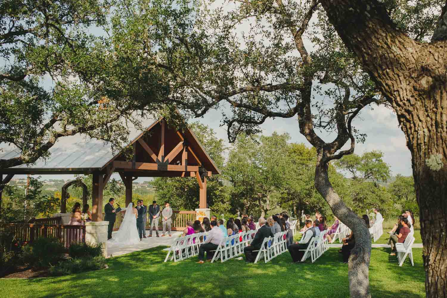 Wide angle photo of the ceremony at The Springs Event Venue Wedding Photos-Philip Thomas