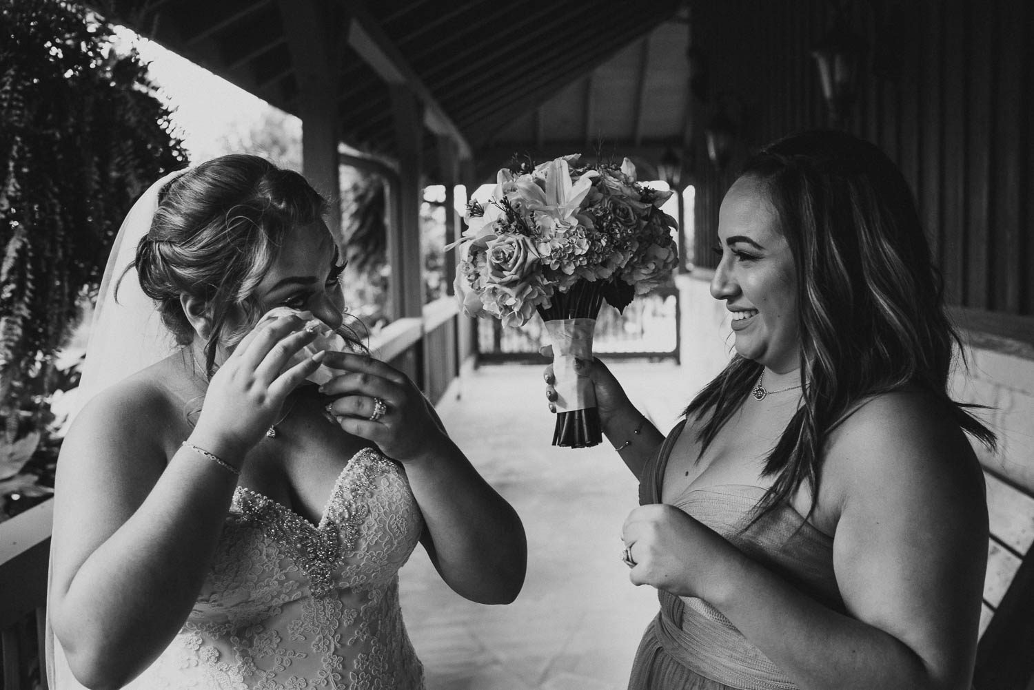 Bride wipes her tear in an emotional moment at The Springs Event Venue Wedding Photos-Philip Thomas