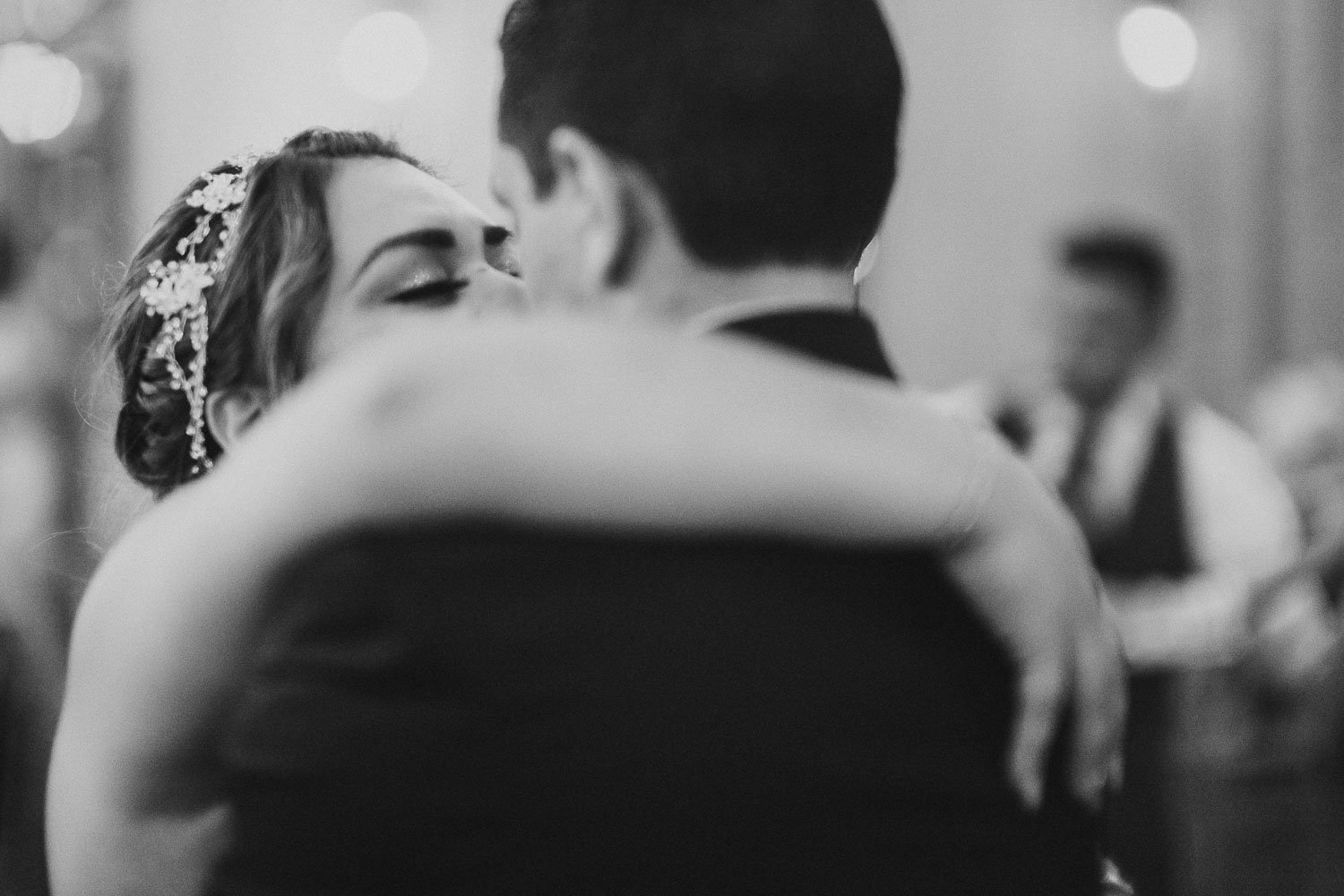 Lovely moment last dance as bride and groom hug and dance closely -The Springs Event Venue Wedding Photos-Philip Thomas