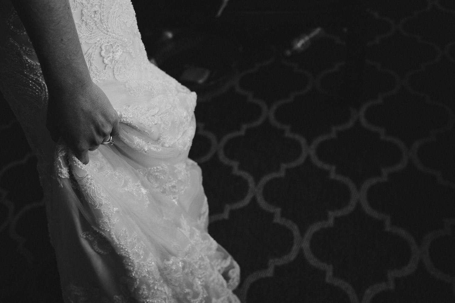 Bride clutches her dress at Paniolo Ranch Wedding Reception-Philip Thomas