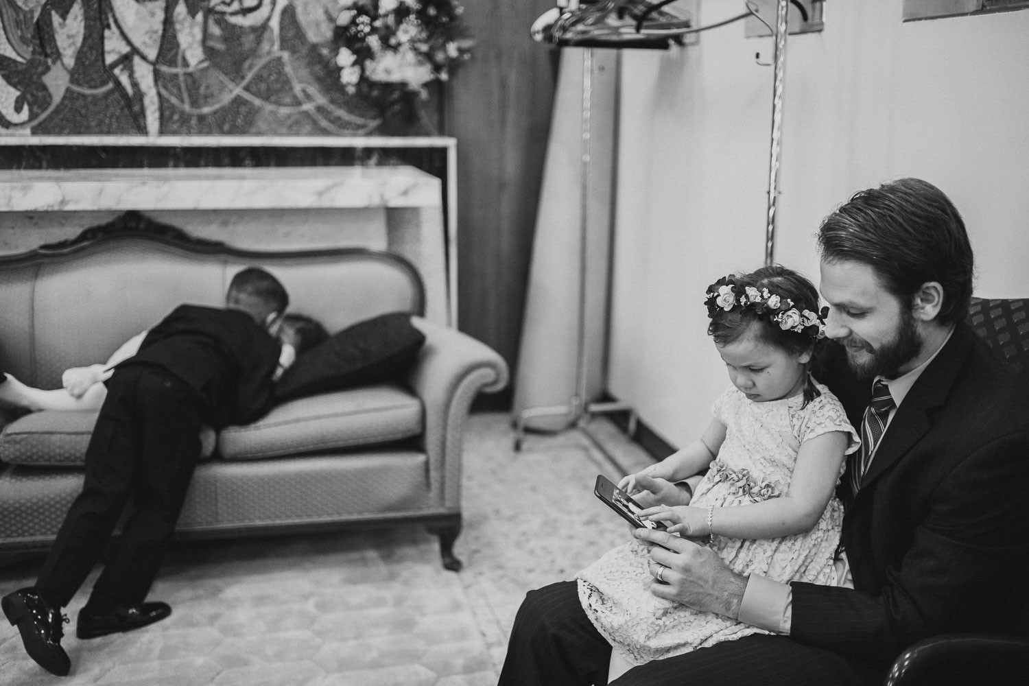 Kids play in the green room whilst waiting for the wedding ceremony to start at Immaculate Conception Chapel at Oblate School of Theology -Philip Thomas