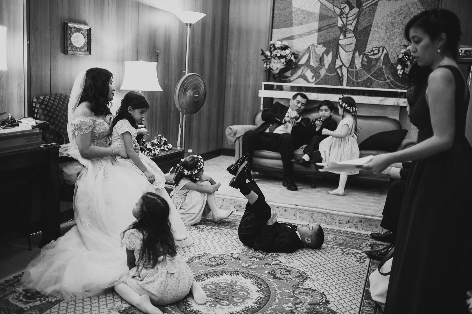 Bride and bridal party relax before the ceremony at Immaculate Conception Chapel at Oblate School of Theology -Philip Thomas