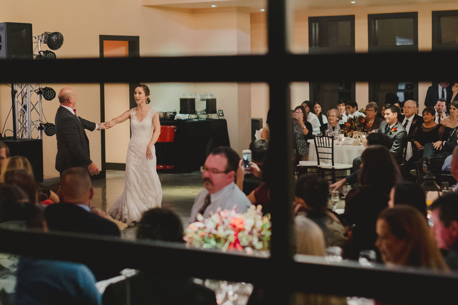 First dance with father of the bride captured through the window at Paniolo Ranch Wedding Reception-Philip Thomas