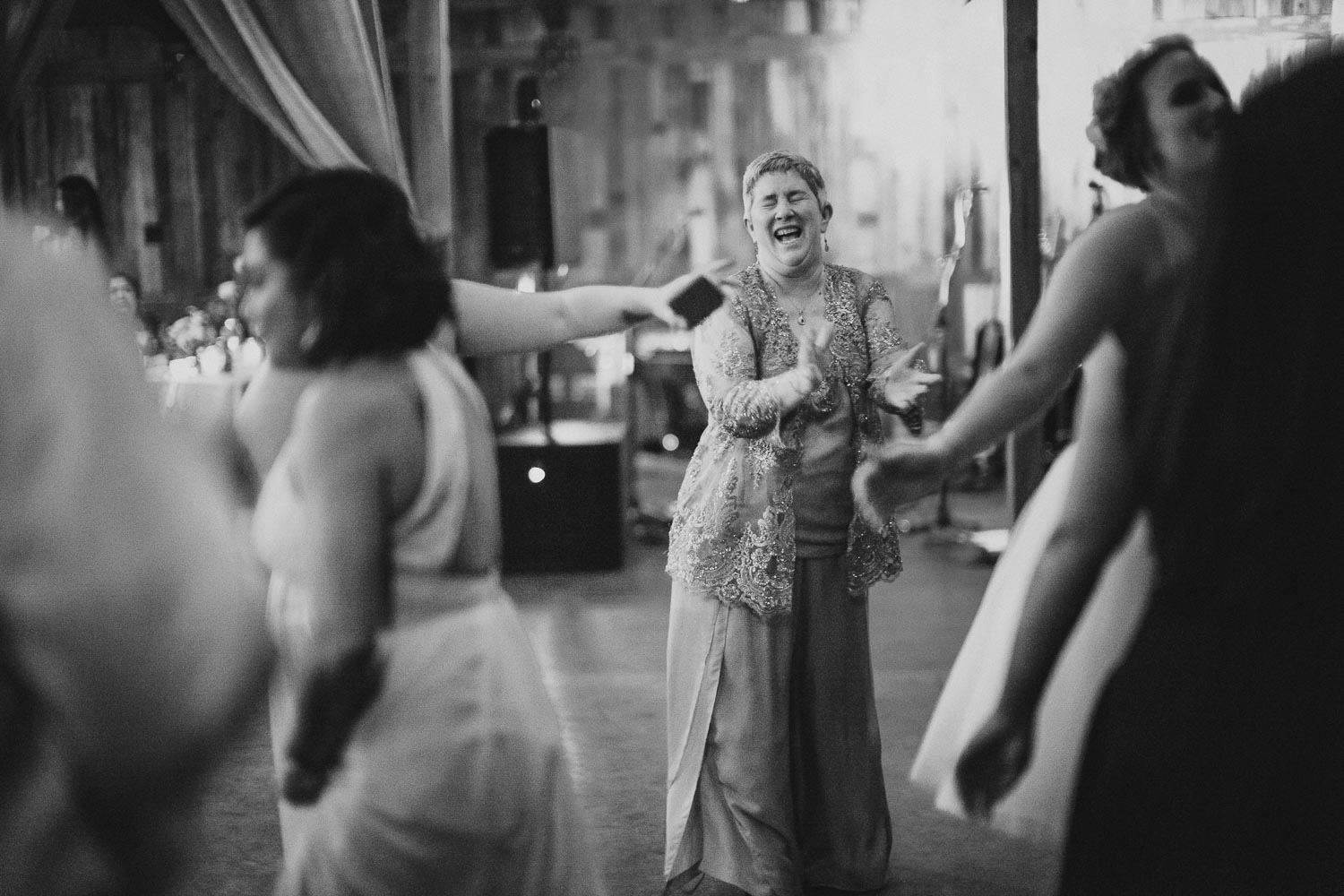 mother of the bride laughs it up RUSTIC BARN WEDDING at VISTA WEST RANCH DRIPPING SPRINGS _ BRANDI + AJ-77