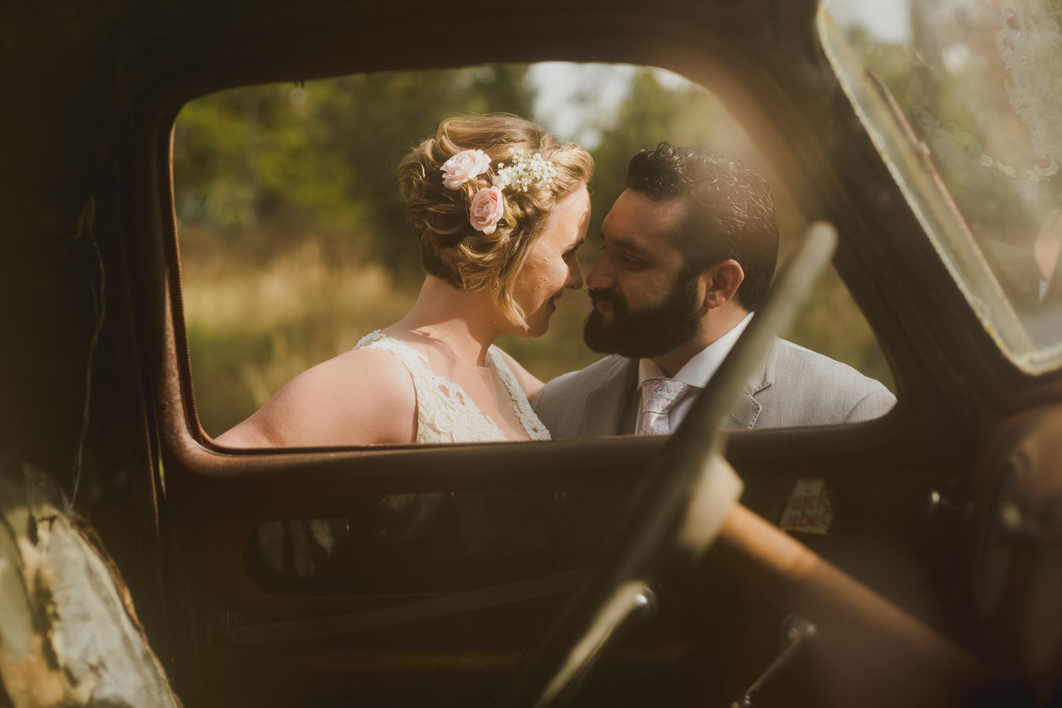 Couple pos through car window at RUSTIC BARN WEDDING at VISTA WEST RANCH DRIPPING SPRINGS _ BRANDI + AJ-25