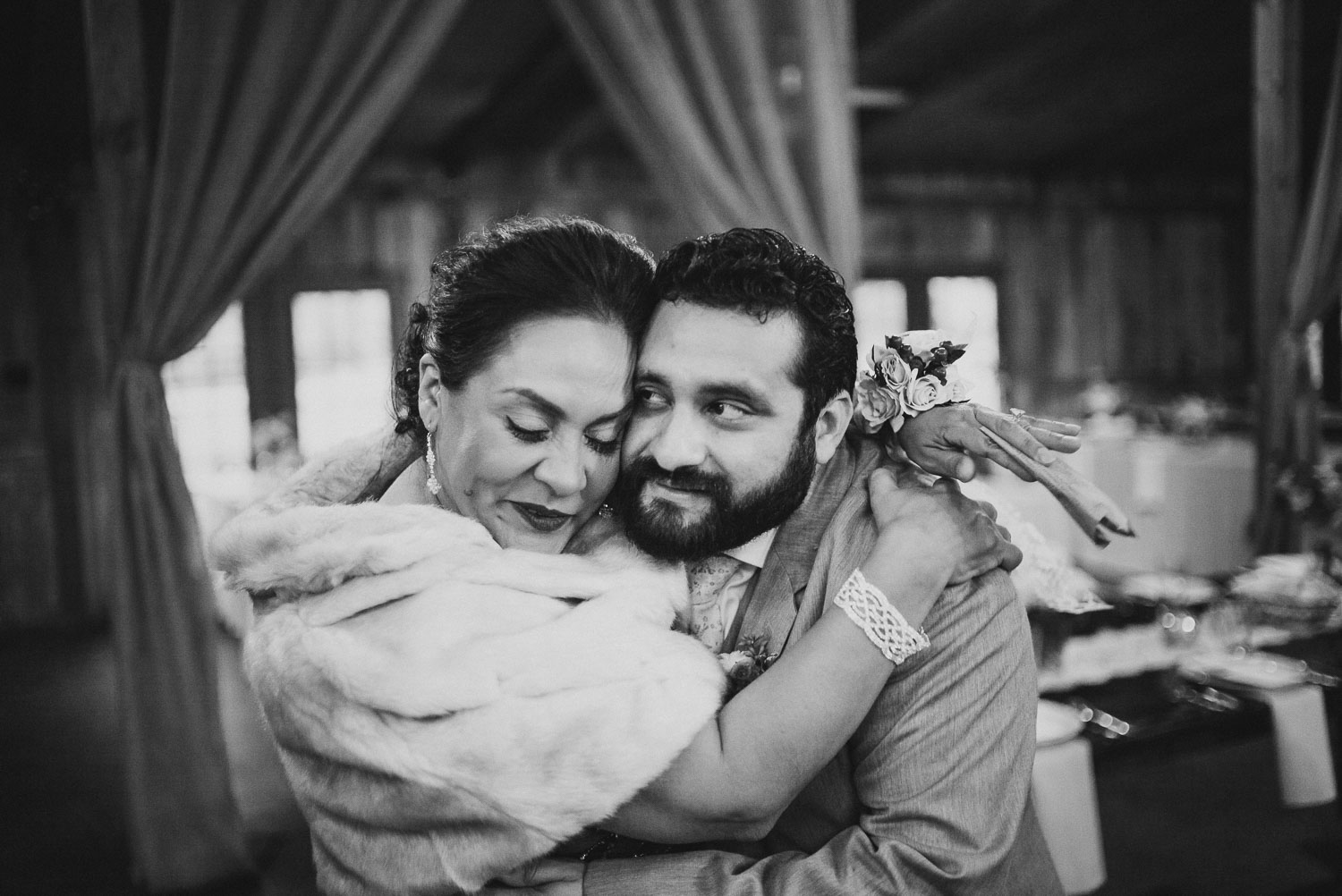 Mother and son hug RUSTIC BARN WEDDING at VISTA WEST RANCH DRIPPING SPRINGS _ BRANDI + AJ-43