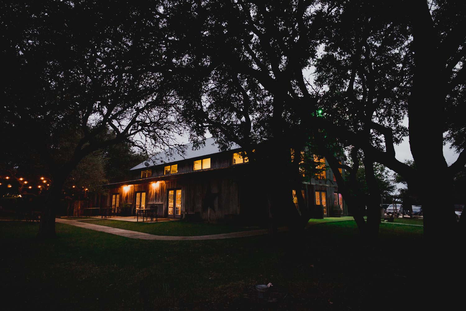 Dusk photo of RUSTIC BARN WEDDING at VISTA WEST RANCH DRIPPING SPRINGS _ BRANDI + AJ-52