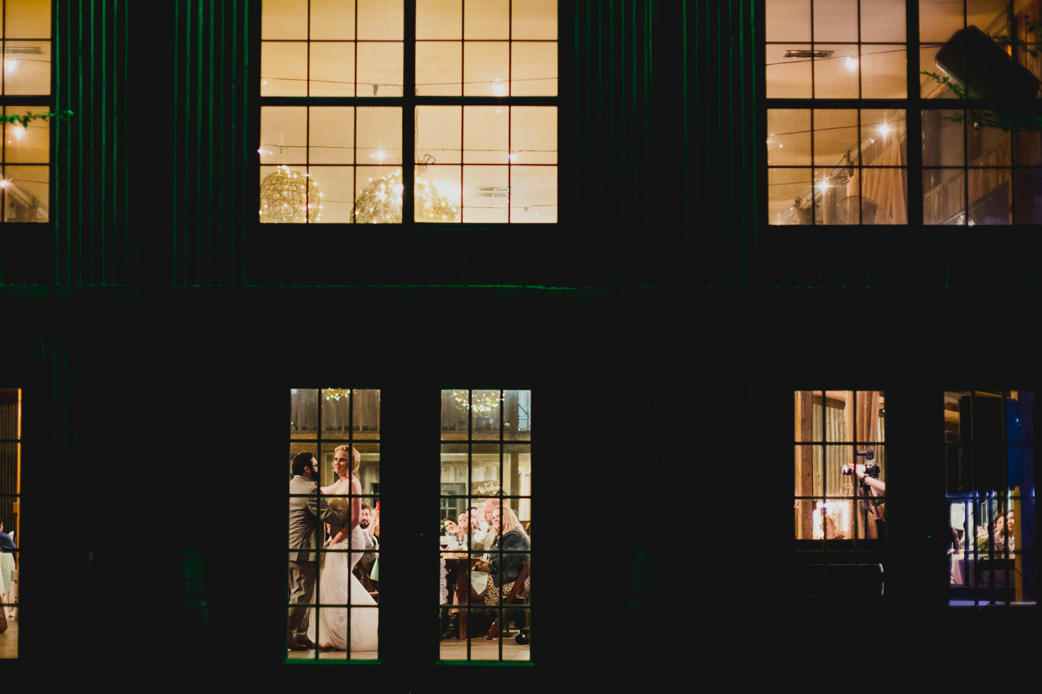 First dance through window of barn RUSTIC BARN WEDDING at VISTA WEST RANCH DRIPPING SPRINGS _ BRANDI + AJ-63