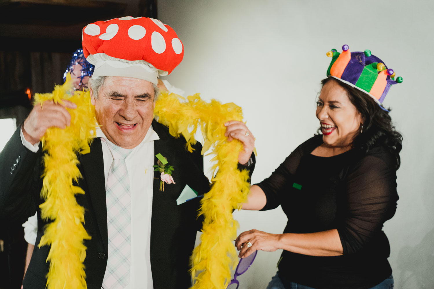 Parents of the groom hamming it up in front of HD booth RUSTIC BARN WEDDING at VISTA WEST RANCH DRIPPING SPRINGS _ BRANDI + AJ-77