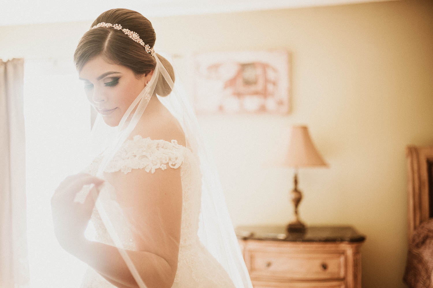 Clarissa adjusting her veil McAllen-South-texas-Wedding