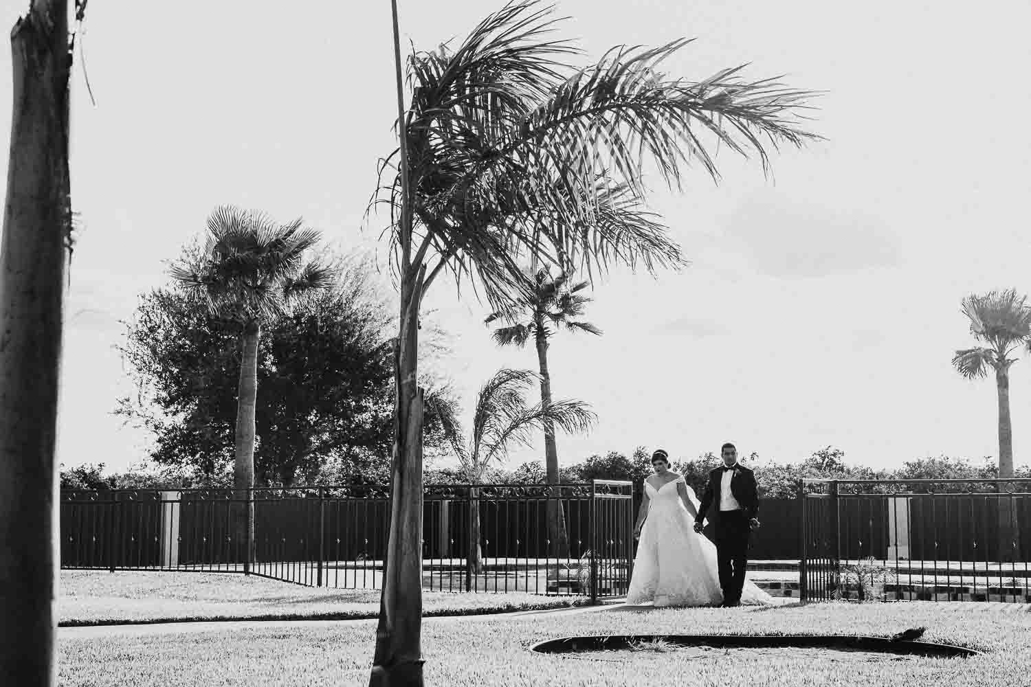 The newly married couple, Eric and Clarissa walk McAllen-South-texas-Wedding