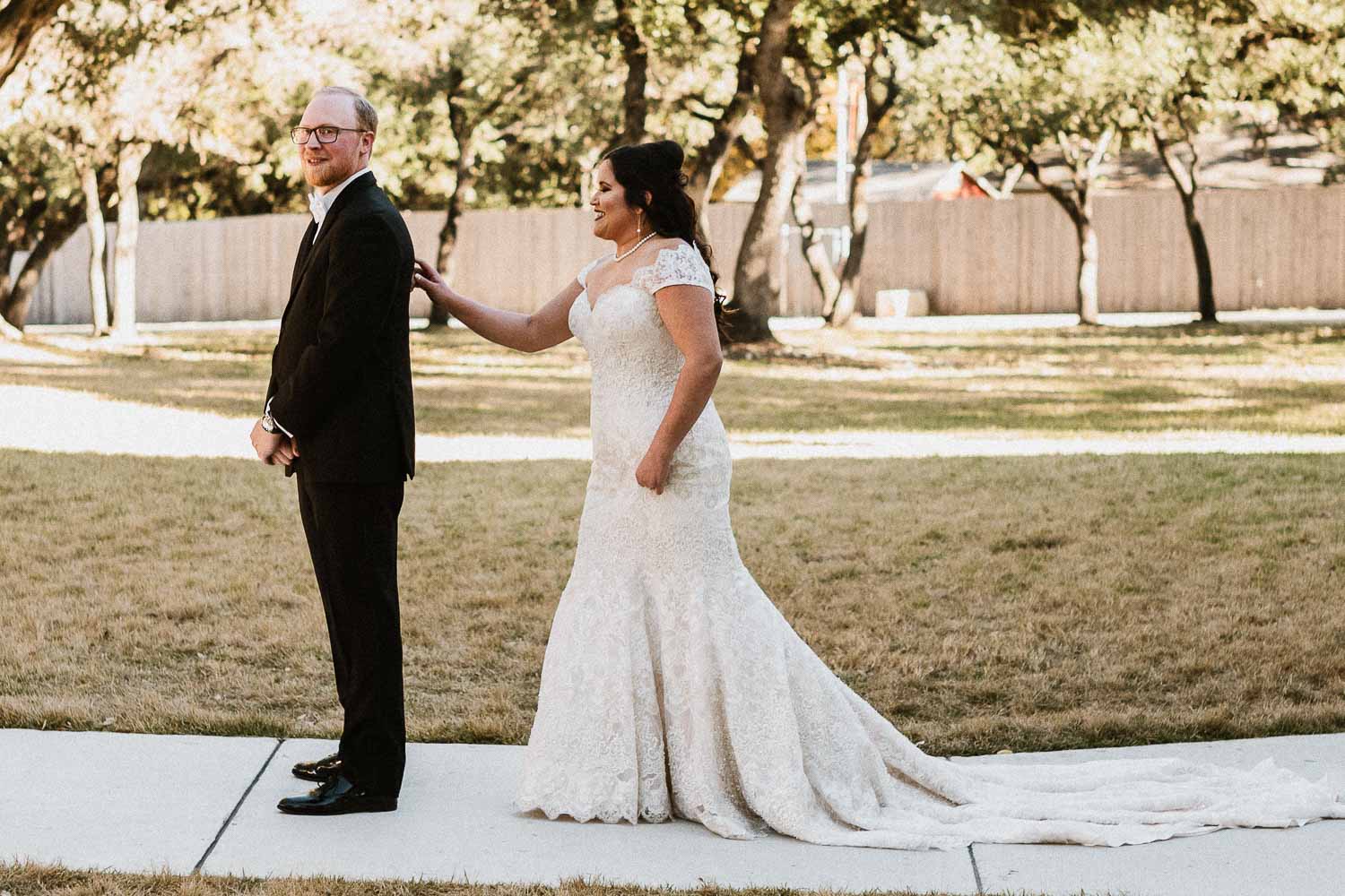 Andrea walks up behind James for their first look - very emotional - 06 The Chandelier of Gruene Wedding Photos -2019-01-09_0001-Philip Thomas Photography