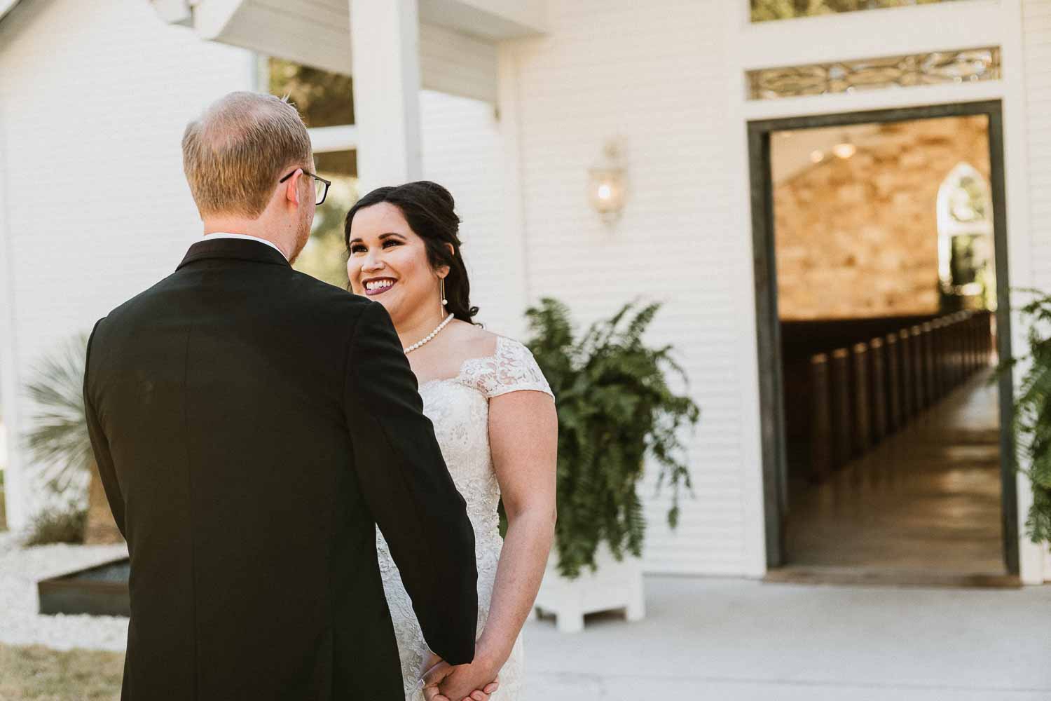 James and Andrea, bride and groom have a private moment first look before their wedding ceremony - 07-The Chandelier of Gruene Weding Photos -L1003745-Philip Thomas Photography