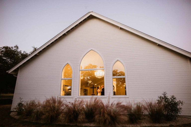 The Chandelier of Gruene Wedding Photos | Andrea + James