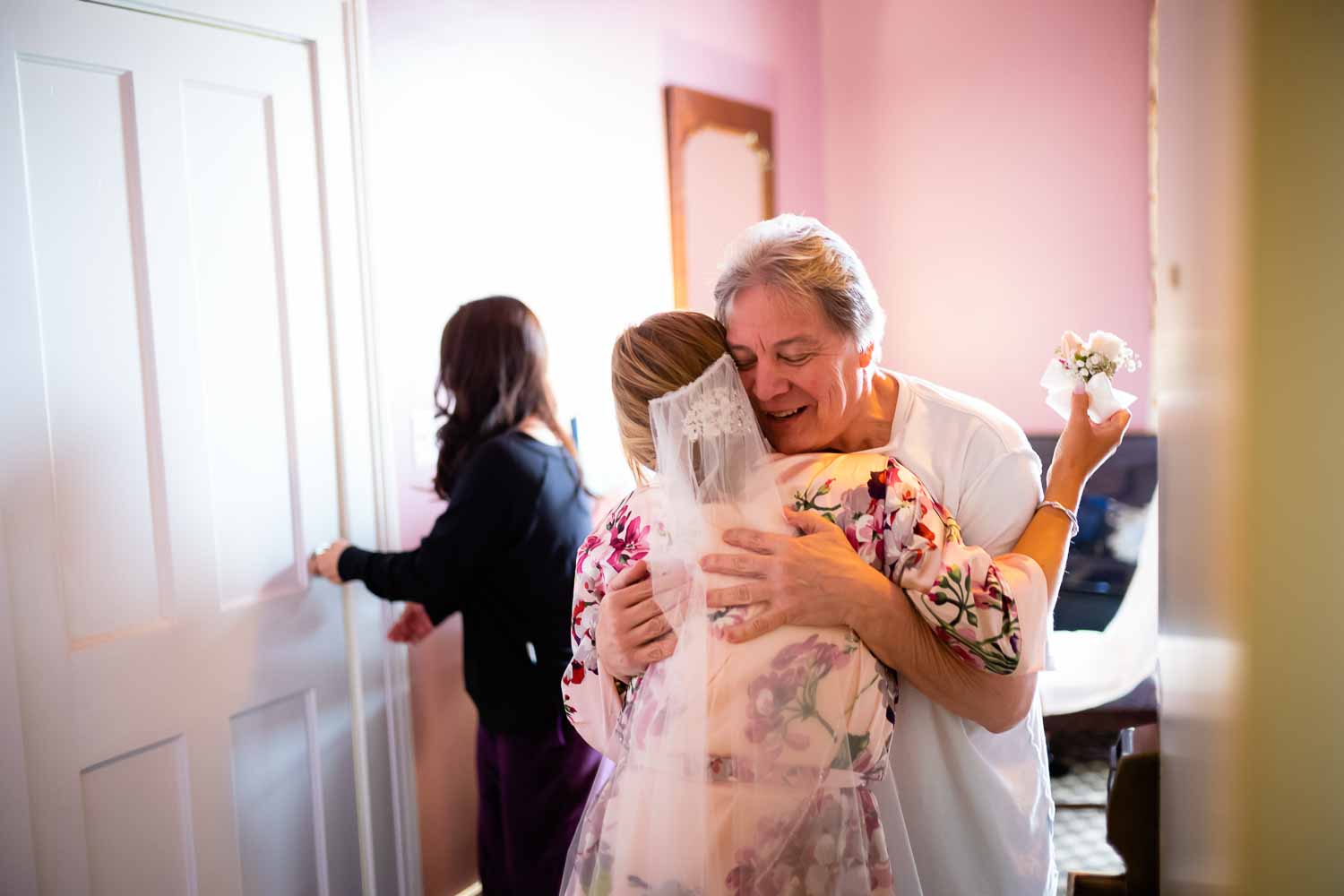 A sweet moments has father of the brides receives a gift from his daughter at the Menger Hotel Wedding Ceremony San Antonio Reception Grand BallroomSan Antonio -Leica photographer-Philip Thomas Photography