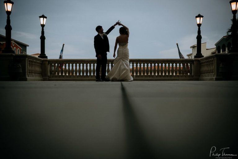 Couple on a balcony overlooking the Hill Country at the luxurious Eilan Hotel-and-Spa Philip-Thomas-Photography