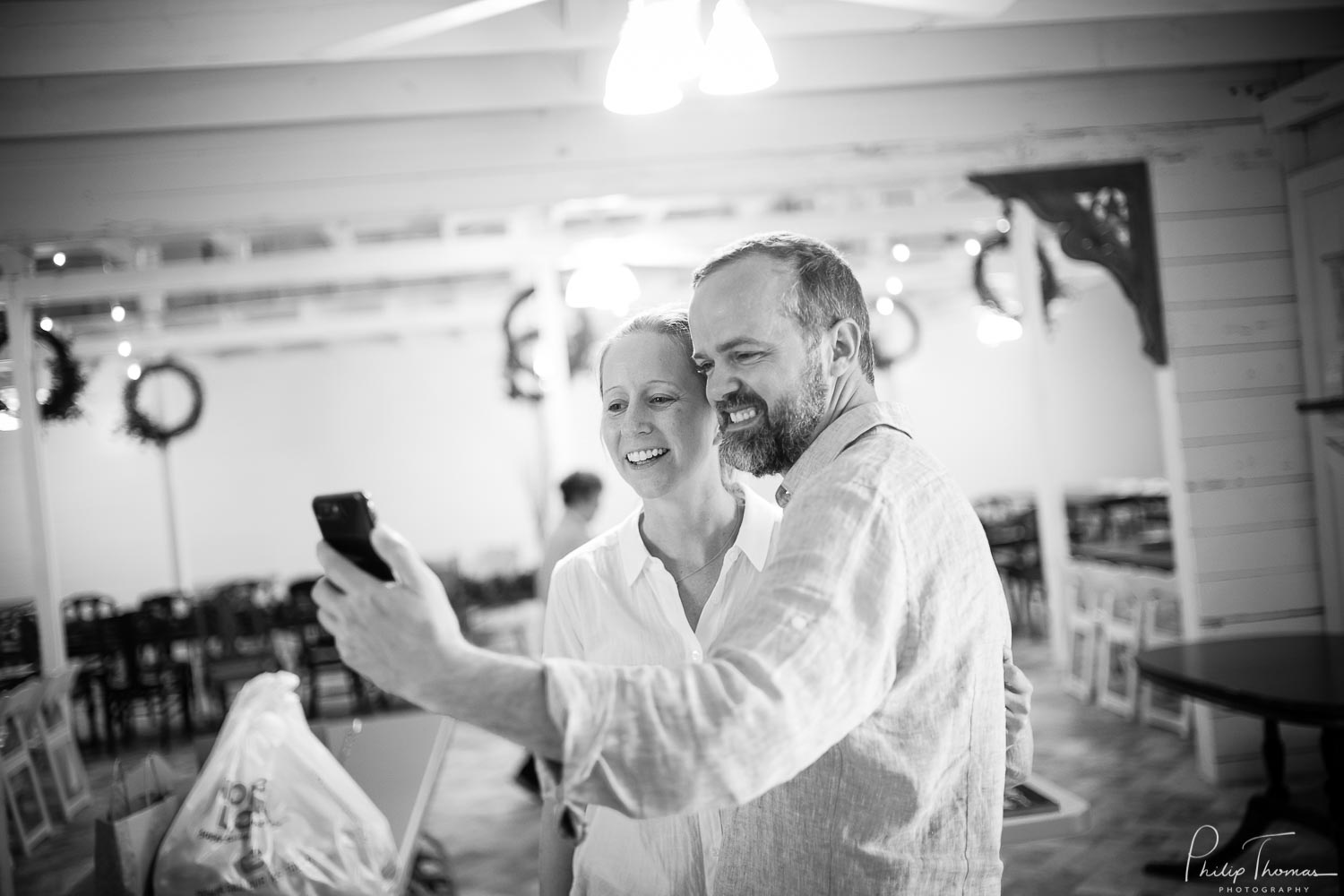 A selfie is created by Minta and Phillip on their wedding day