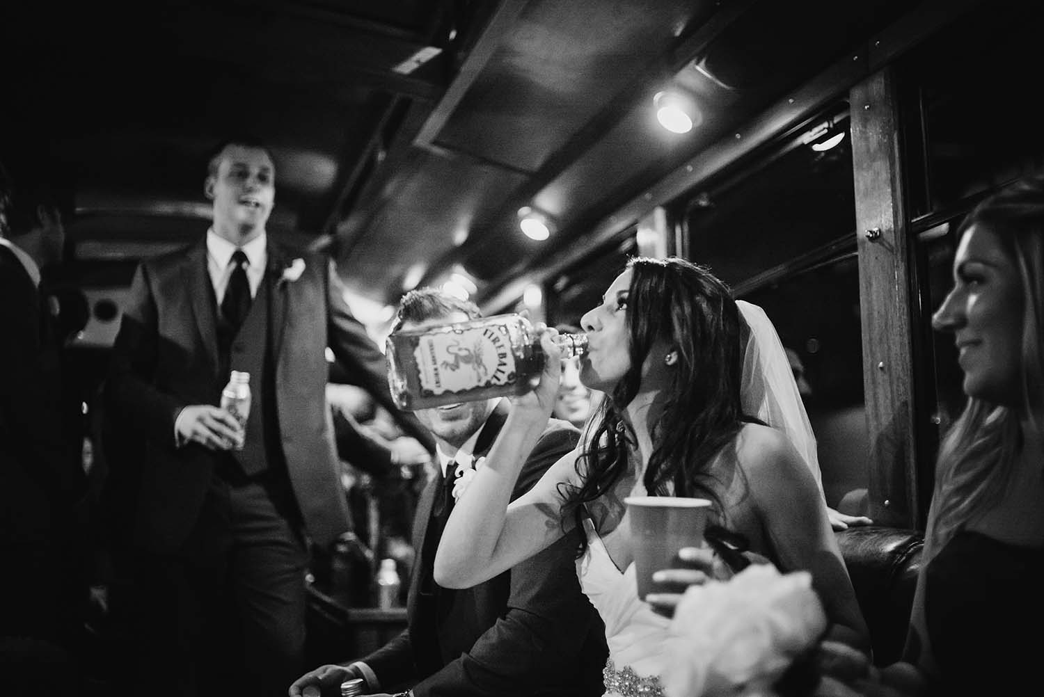 San Antonio bride drinking gin on bus after tying the knot on a winter's day
