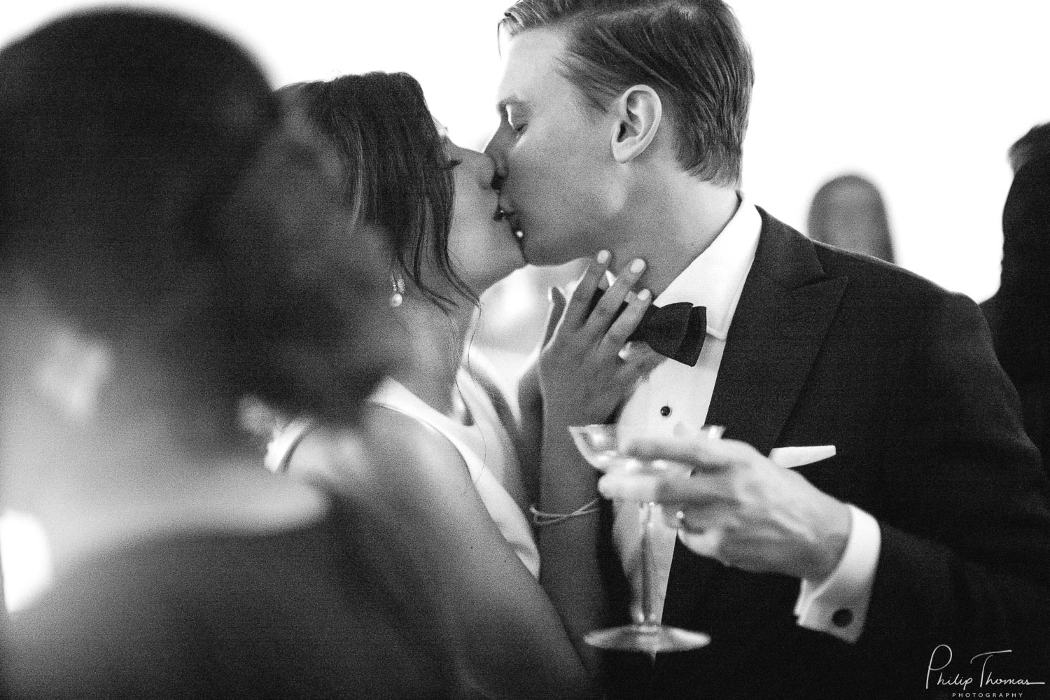 A stolen kiss Sofia and Jake kiss on the Houston dance-floor - Annunciation catholic Church JW Marriott Houston Downtown, 806 Main St, Houston wedding reception-Leica photographer-Philip Thomas Photography