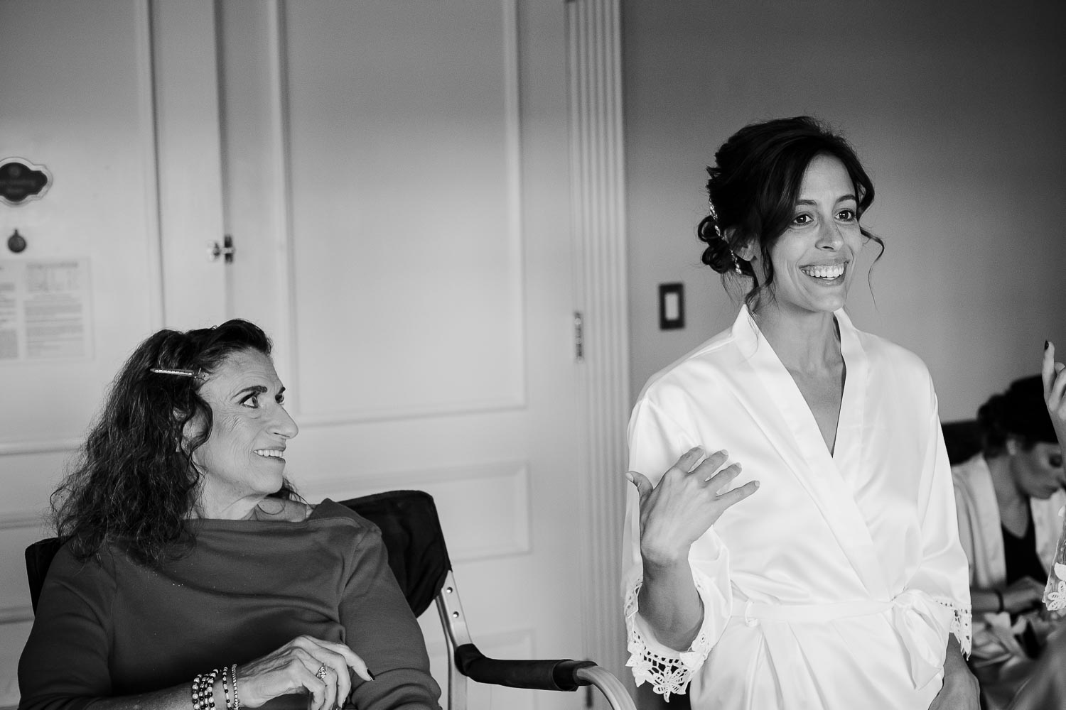 Mother of the bride looks affectionally to her daughter who marries today at Driskill Hotel in Austin Texas