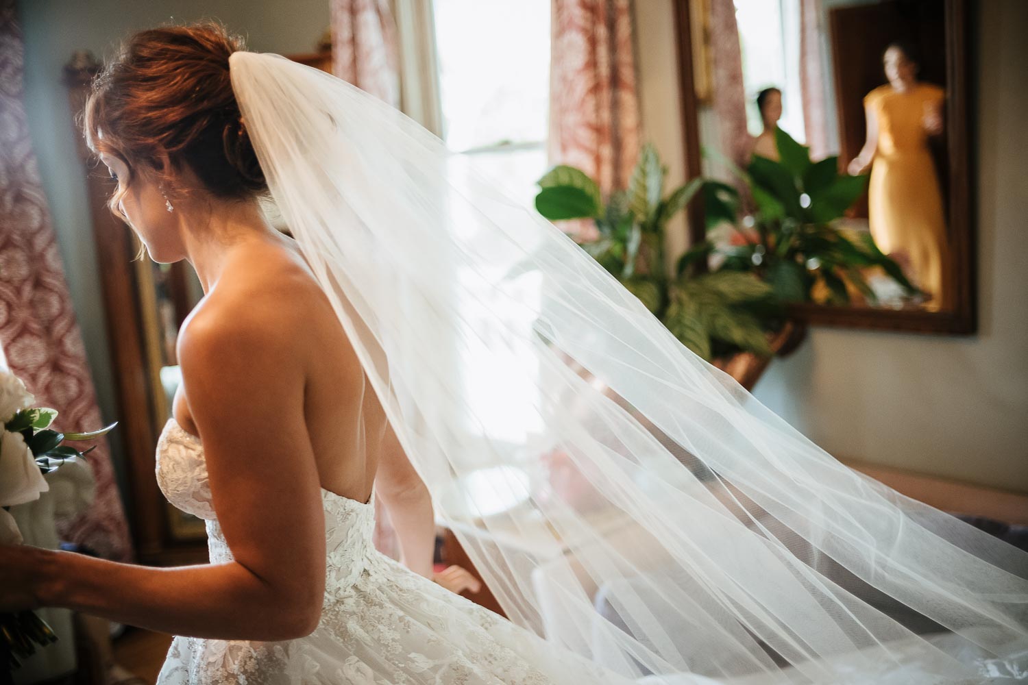 Brides veil diagonally at Barr Mansion, Texas
