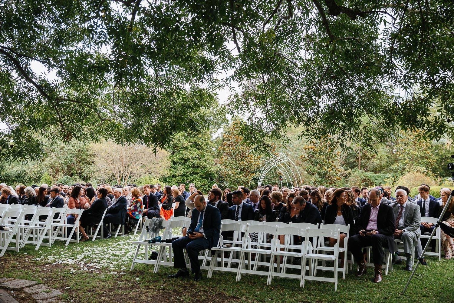 Pre ceremony wide shot of guests at Jewish wedding ceremony Barr Mansion, Texas