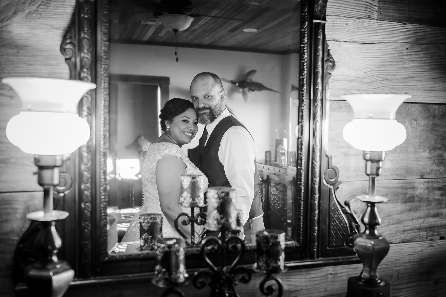 Couple pose in mirror -The-Venue-at-Rafter-E-Ranch-Leica-wedding