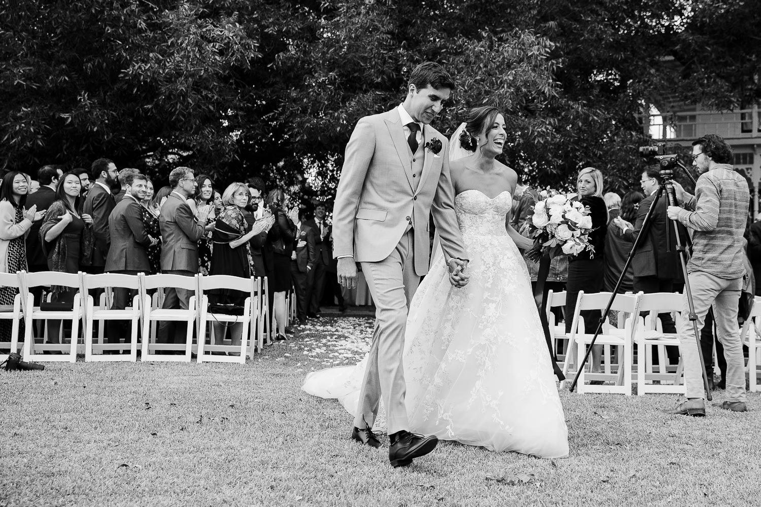 Just married couple walk down the aisle at Barr Mansion, Texas