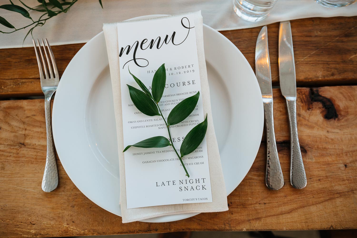 Picture shows menu on a plate at Barr Mansion, Texas during wedding ceremony