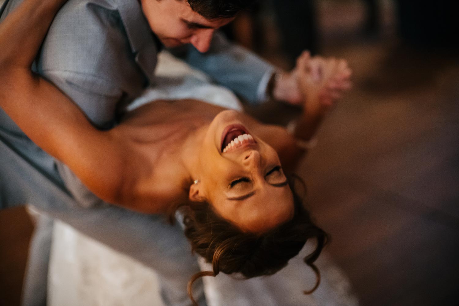 Leica M10-P and a 50mm noctilux shot wide open as bride is dipped at end of first dance Barr Mansion, Texas