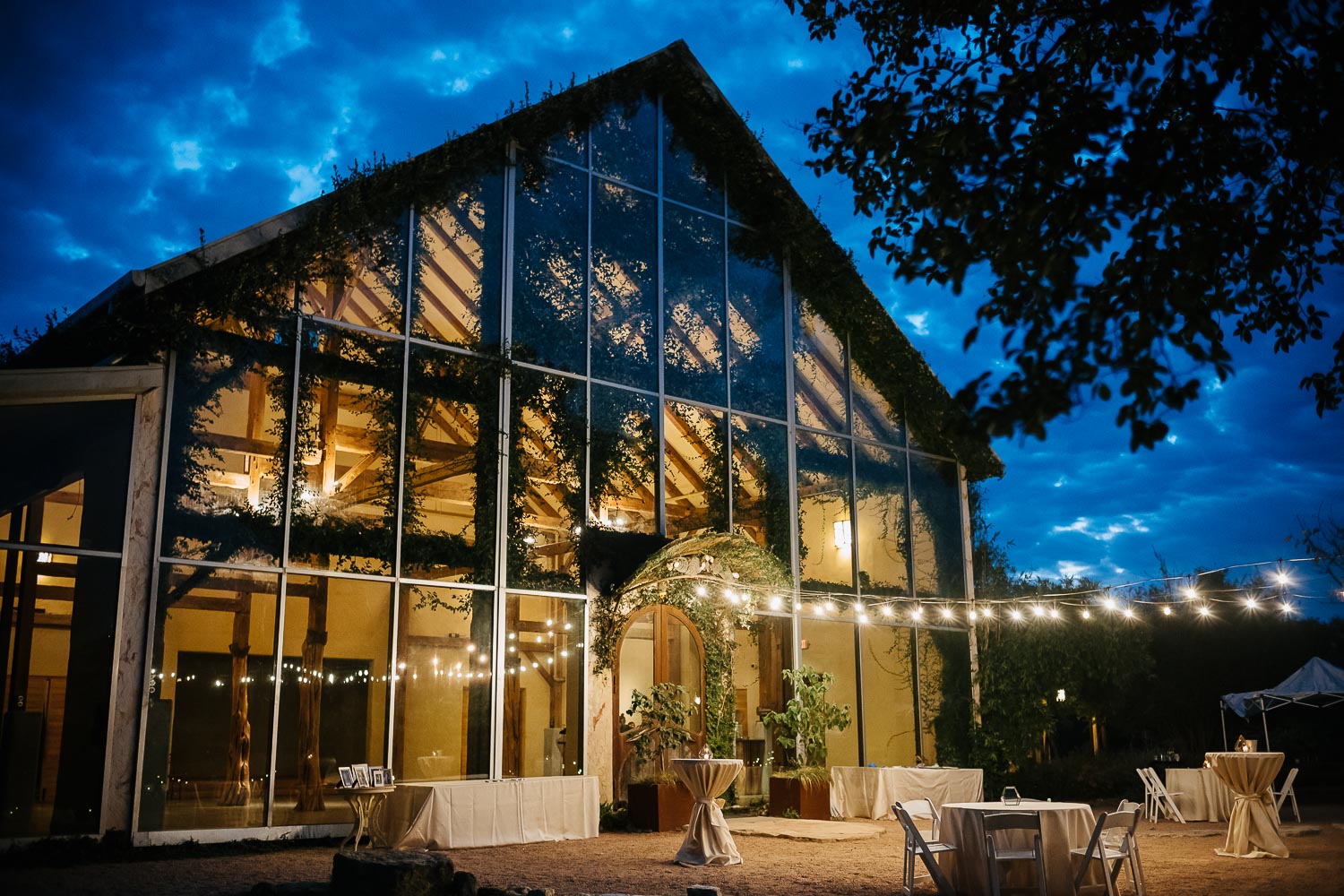 A twilight shot of the Glass Ballroom at Barr Mansion, Texas