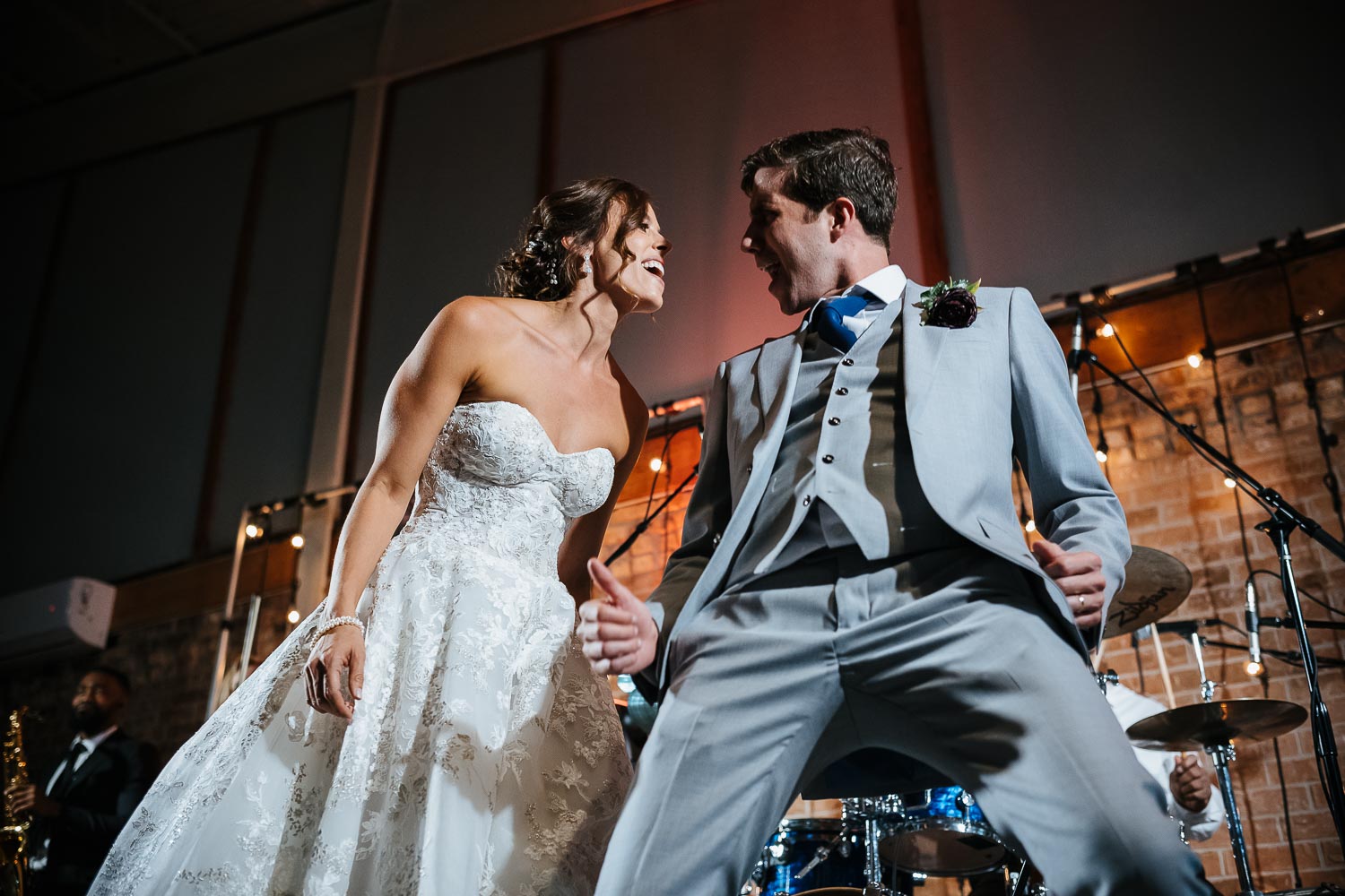 Married couple sing along on stage at Barr Mansion, Austin
