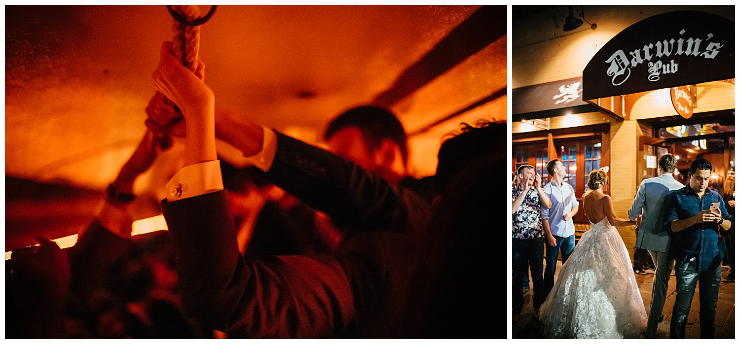 Man holds railing inside of a bus on trip to downtown Austin after party