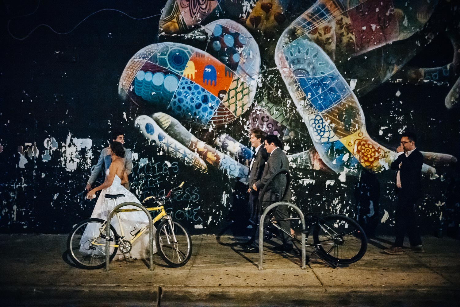 Just married couple past an Austin Muriel on 6th street, Austin