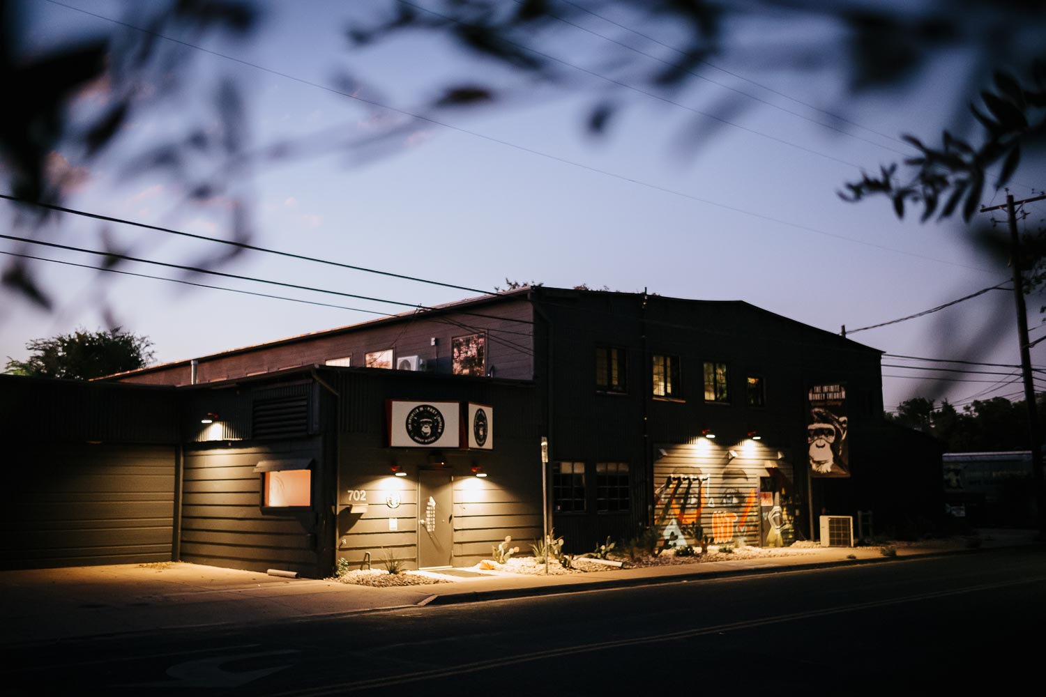 A beautiful twilight photo of The Infinite Monkey Theorem in Austin Texas