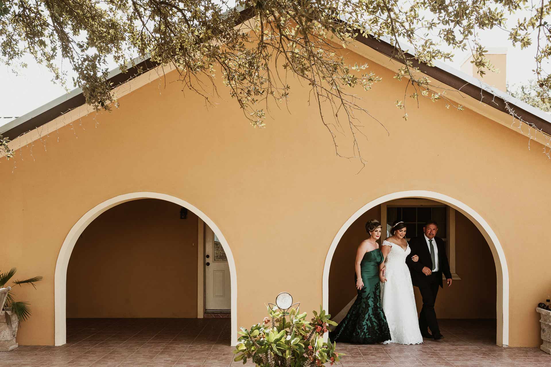 A bride and her parents leave their Mission home in south Texas for her wedding