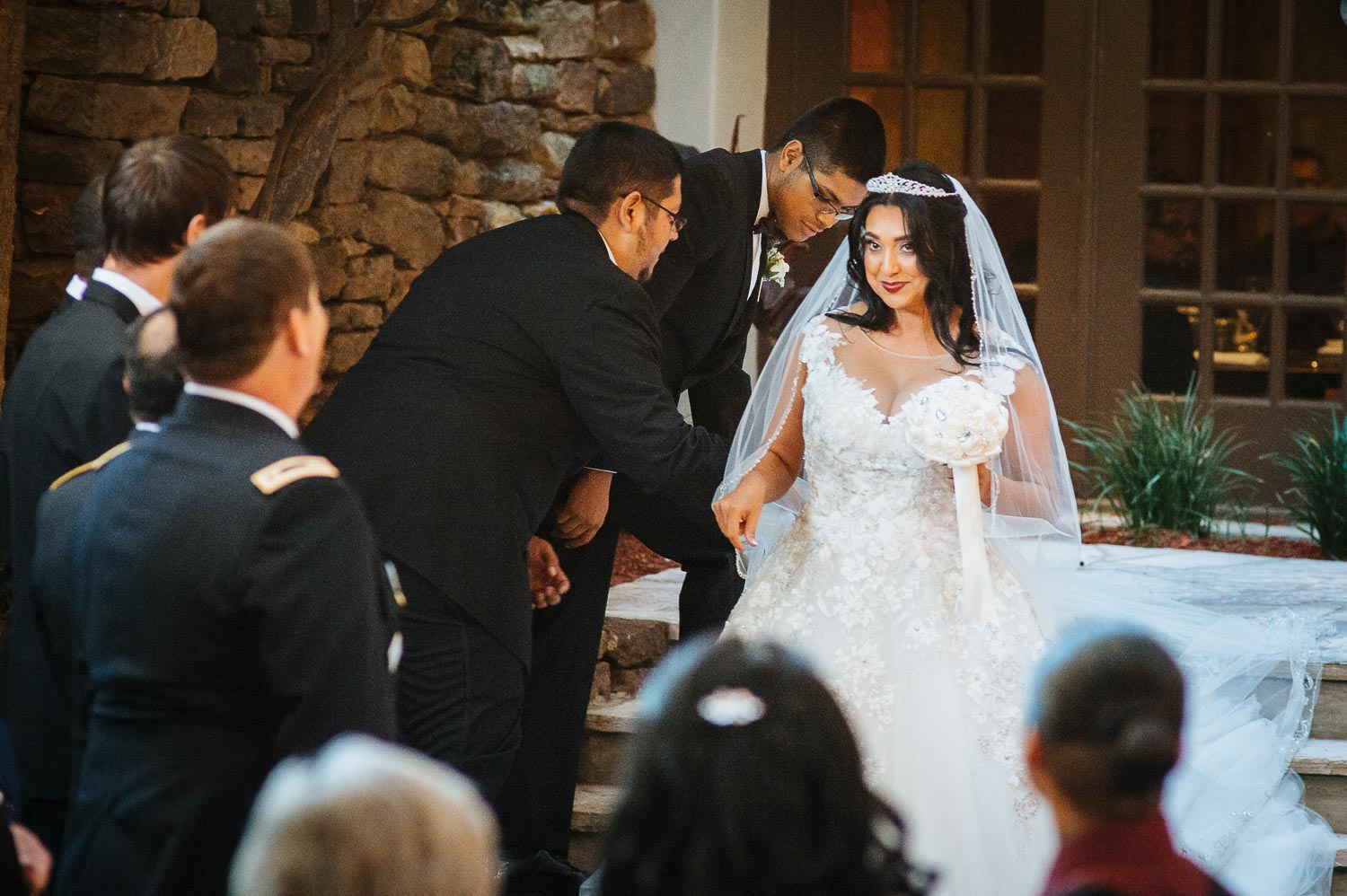 The look on the brides face of happiness as she views the groom at Omni La Mansion Riverwalk hotel in San Antonio Texas during a fall wedding 2019