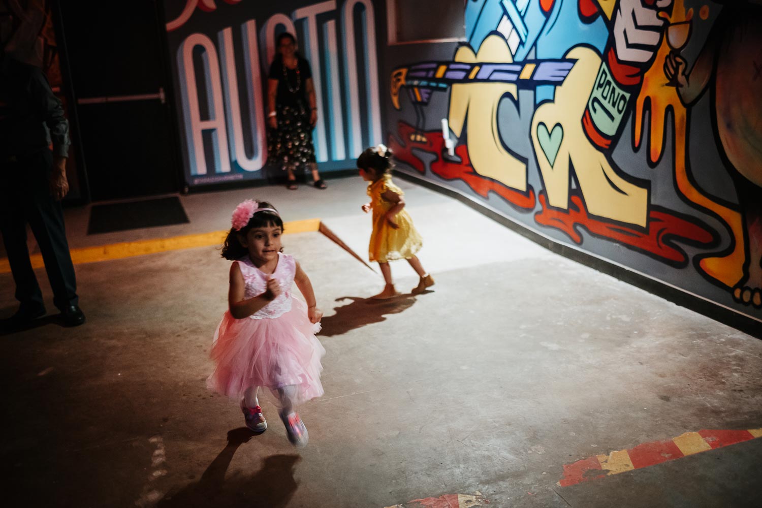 Kids play chase at a rehearsal dinner The Infinite Monkey Theorem Austin Texas