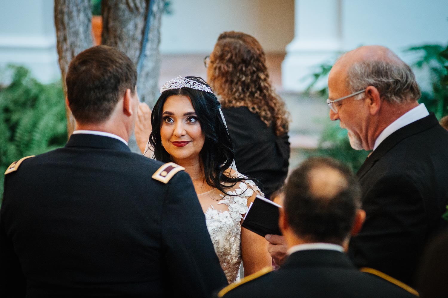 During their vows , the bride makes eyes contact with the groom