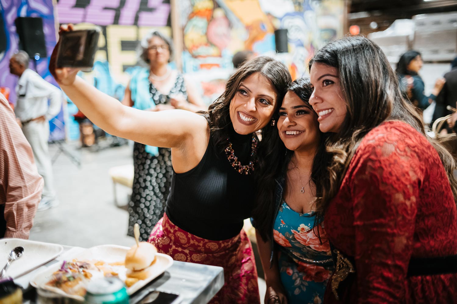 The bride on the left poses for slefies at The Infinite Monkey Theorem