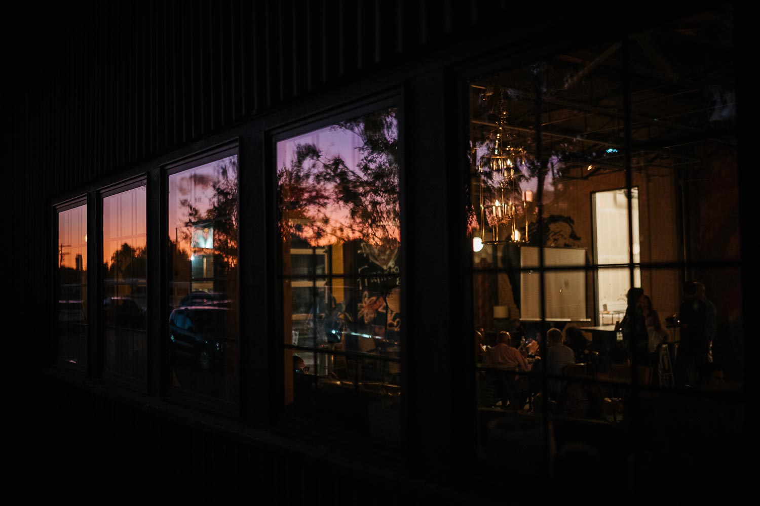 The Infinite Monkey Theorem with reflection in windows at dusk